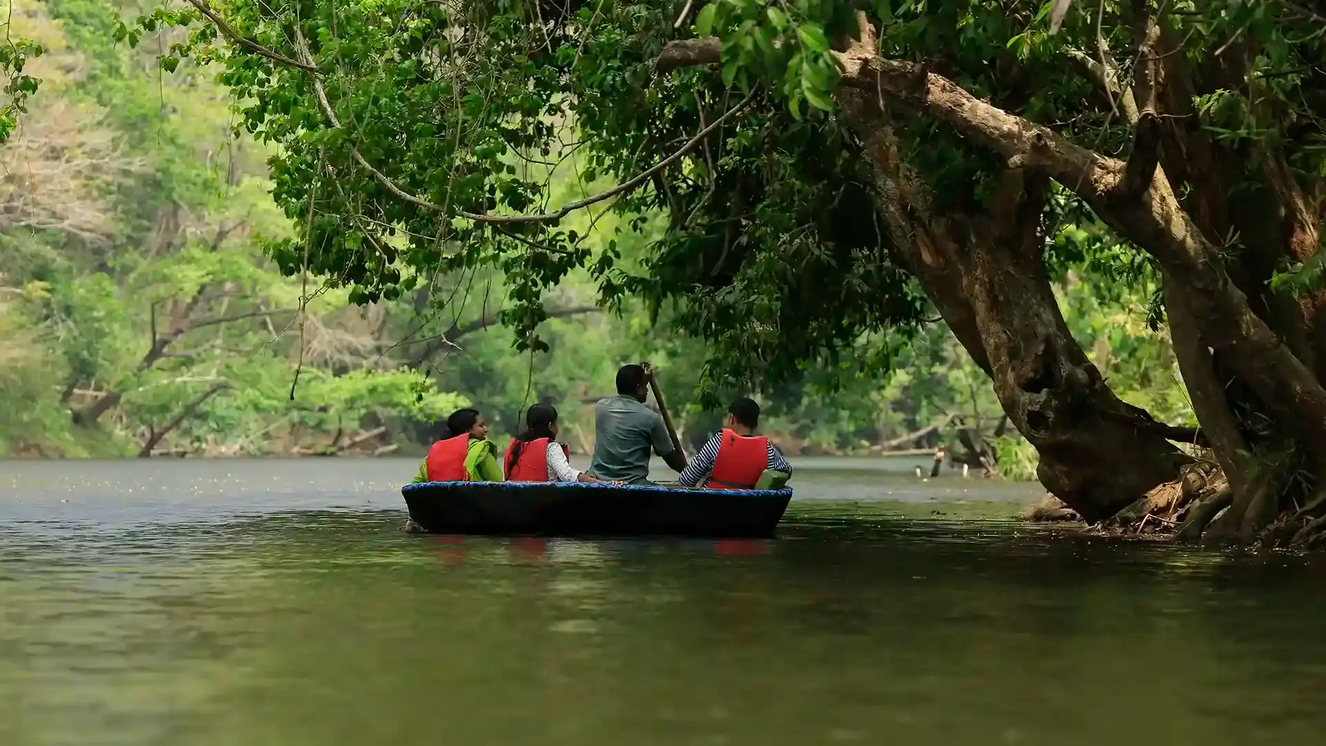 Traditional coracle boat on the Tungabhadra River in Hampi