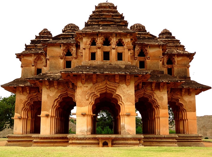 A stunning Indo-Islamic architectural marvel, known for its lotus-shaped design, arched windows, and cooling chambers of the Vijayanagara Empire.