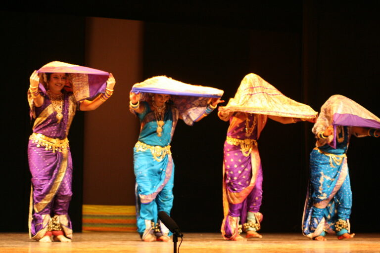 Lavani is a fast-paced, energetic, and sensuous folk music tradition of Maharashtra, often performed by women dancers wearing traditional sarees and ghungroos (ankle bells).