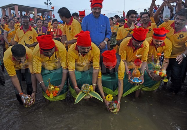 Narali Purnima is a Hindu festival celebrated in coastal regions of India, marking the end of the monsoon season with the offering of coconuts to the sea.