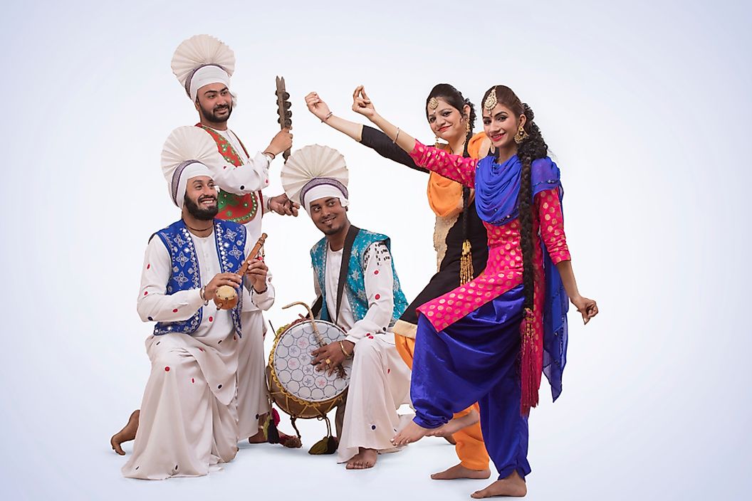 Lively beats Traditional Punjabi folk dance performed with dhol drums during harvest festivalssymbolizing PEnergetic dance by men celebrating joy and harvest.unjab’s spirit, often played during harvest.