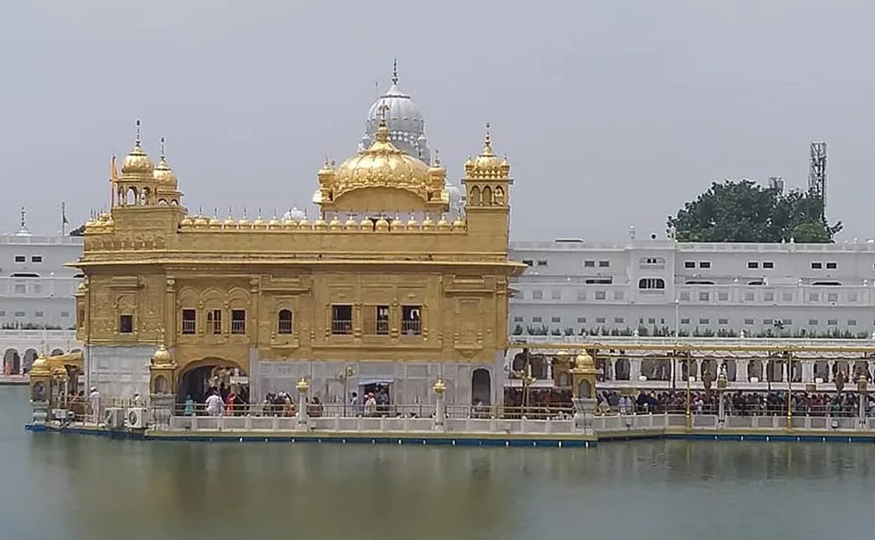 The top place to visit in Punjab and most sacred site for Sikhs, the Golden Temple is a breathtaking structure covered in gold and surrounded by a holy water tank (Sarovar).