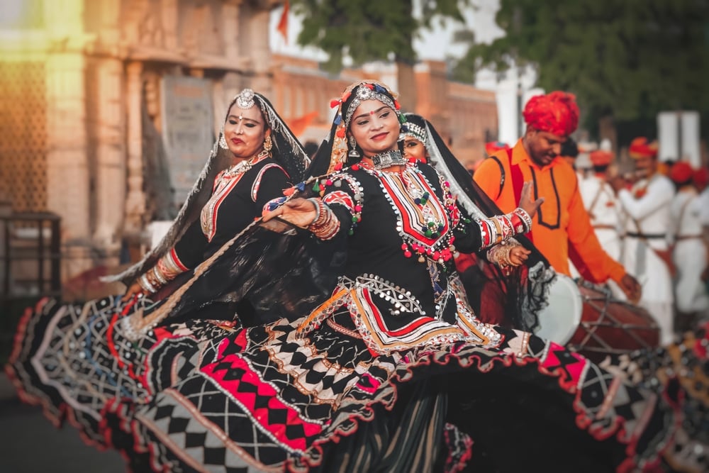 Kalbeliya snake dance - Tribal performers in black mirrored costumes in Rajasthan-jaipur.