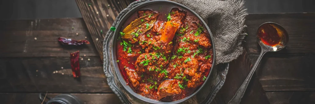 Laal Maas curry - Spicy Rajasthani mutton dish with Mathania chilies