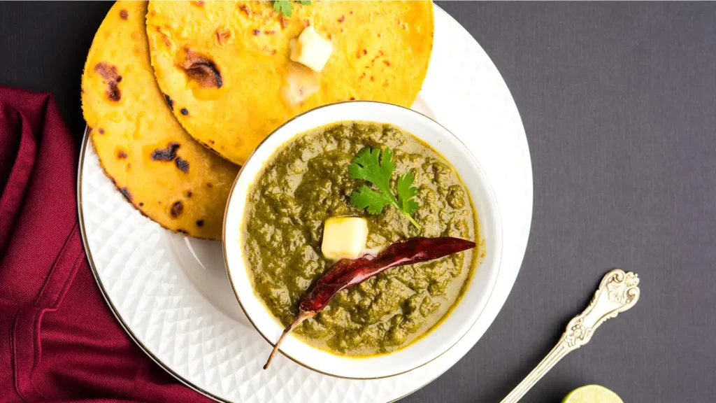 Classic Punjabi winter meal with cornbread and mustard greens curry