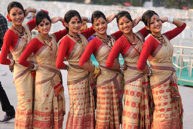 A graceful two-piece outfit made from Muga, Pat, or Eri silk, featuring traditional Assamese motifs.