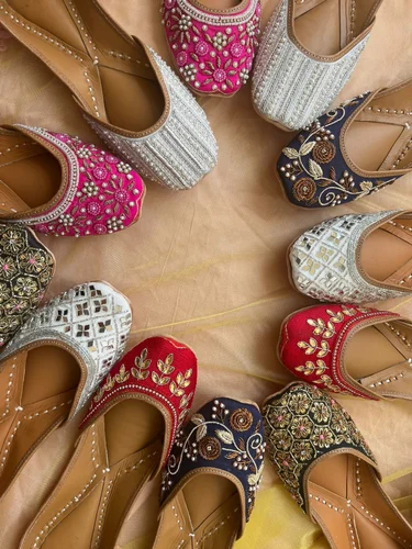 Handcrafted traditional footwear with embroidery and mirrors from Amritsar, Punjab