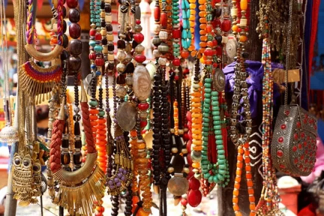 Khasi tribal jewelry made of silver and beads – necklaces, earrings, and bangles at Iewduh Market, Meghalaya.