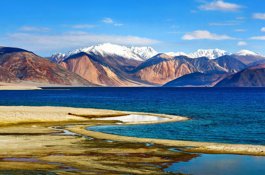 A tranquil, high-altitude lake in Changthang region with deep blue waters.