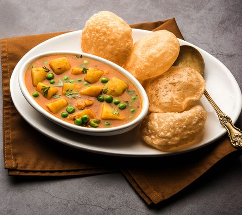 Relish delicious Aloo Puri in Rishikesh, a classic North Indian breakfast.