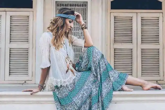 Goa’s Anjuna Flea Market hippie clothes – colorful tie-dye dresses, crochet tops, and flip-flops showcasing the boho vibe of Goa.