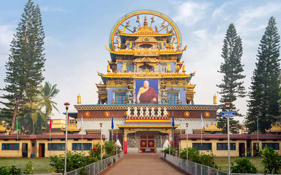 Golden statues at Namdroling Monastery - must-see Tibetan cultural places to visit near Mysuru