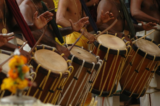 Energetic Chenda Melam percussion ensemble performing at a Kochi festival.