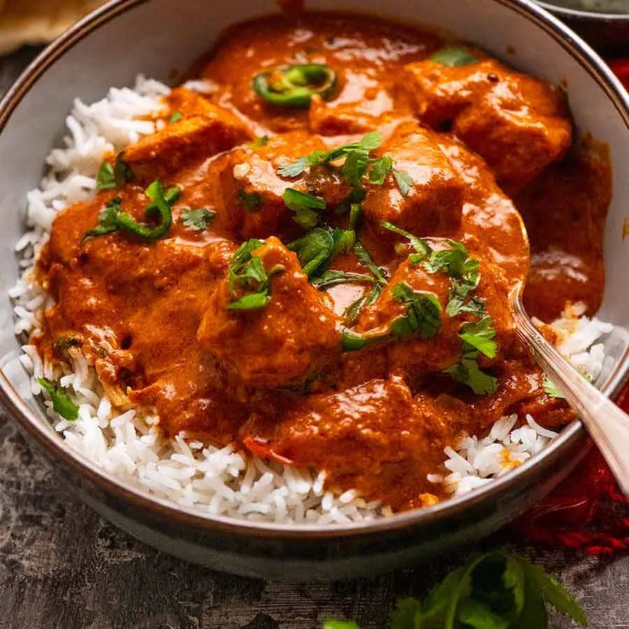 Goa’s traditional Xit Kodi (Fish Curry Rice) – fresh seafood in spicy coconut curry served with steamed rice.