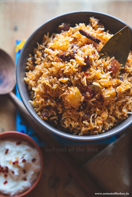 Flavorful Goan Choriz Pulao – fragrant rice cooked with spicy local sausage, onions, and Goan spices.