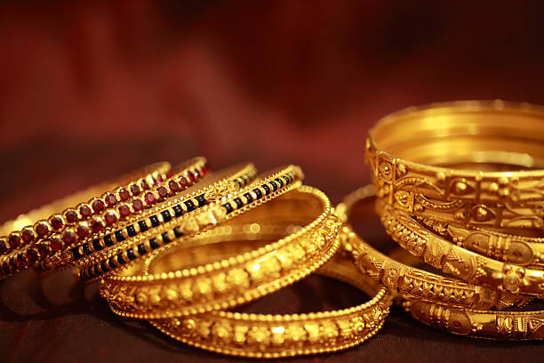 Intricate Kerala Gold jewelry at a Kochi souvenir shop.