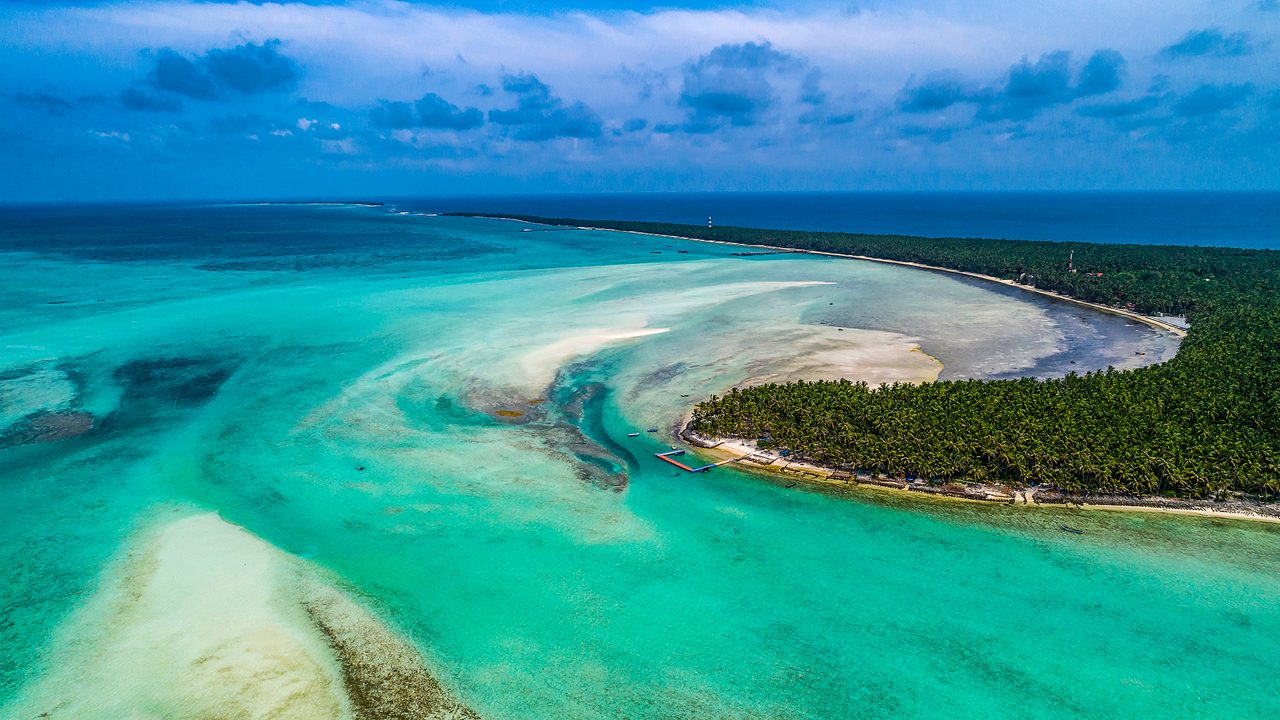 Kalpeni Island in Lakshadweep surrounded by coral debris and lagoons.