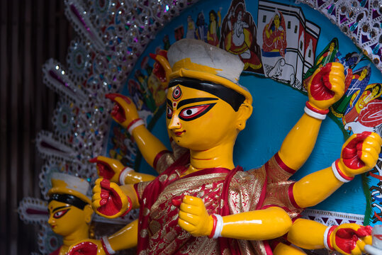 Discover unique places to visit in Kolkata like this traditional potters' quarter crafting Durga idols