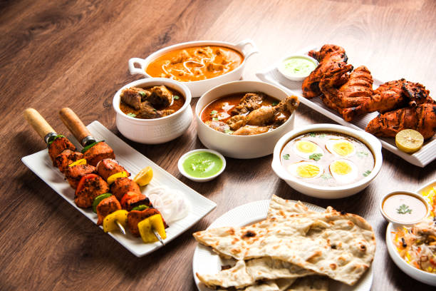 Mughlai dishes with kebabs and curries – traditional food of Agra