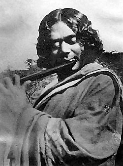 Classical singer performing Nazrul Geeti at a cultural event in West Bengal