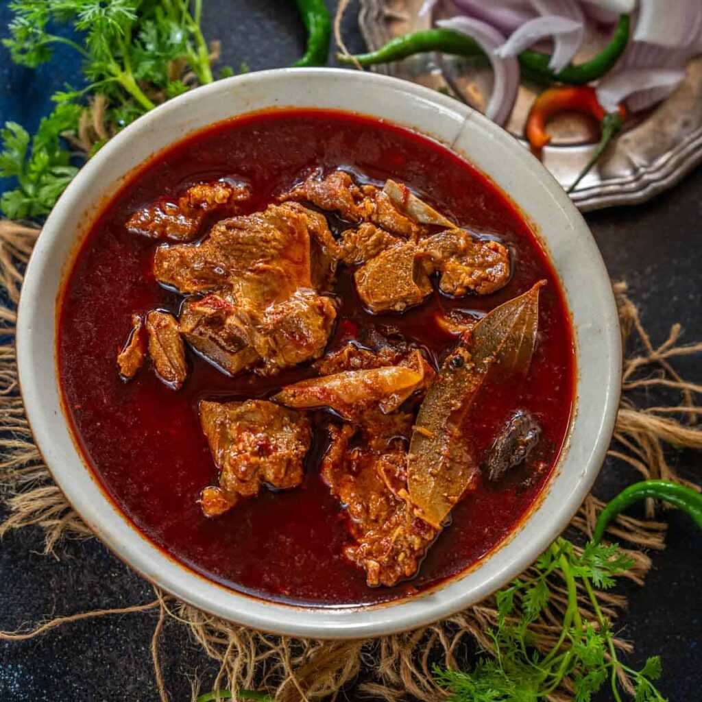 Plate of Rogan Josh, a signature dish of Kashmiri cuisine.