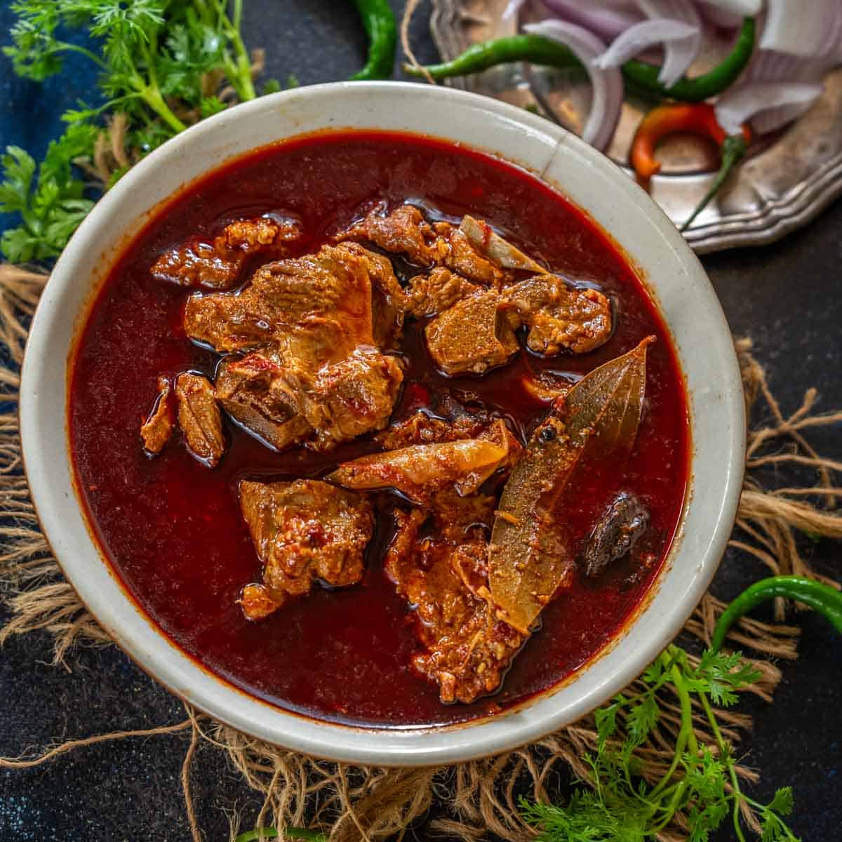Plate of Rogan Josh, a signature dish of Kashmiri cuisine.