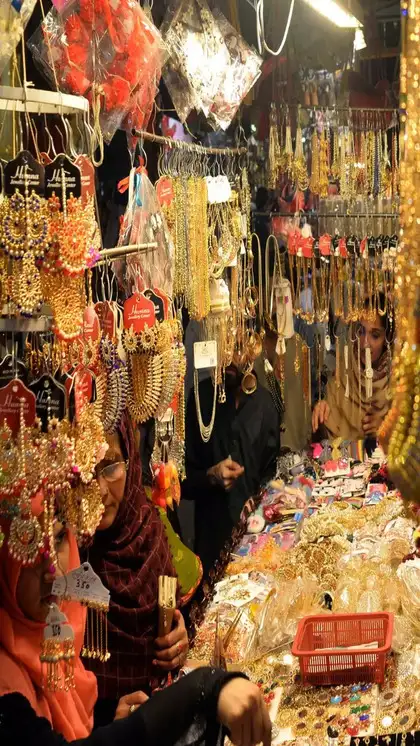 Goa’s iconic Anjuna Flea Market – colorful stalls selling boho clothes, handmade handicrafts, and vintage vinyl records under the sun.