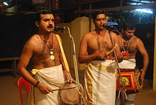 Traditional temple music performance in Munnar.