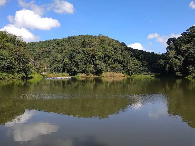 Serene Tamdil Lake surrounded by forests, peaceful natural place to visit near Aizawl