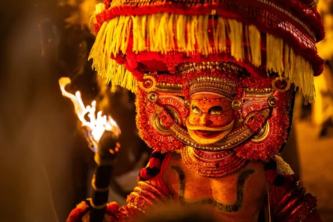 Ritualistic Theyyam art form witnessed near Munnar.