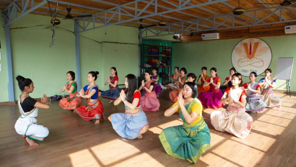 Witness graceful yogic dance in Rishikesh, blending movement and spirituality.