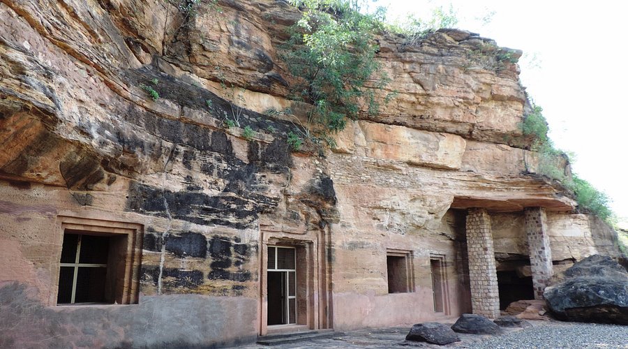 Ancient rock-cut caves near Dhar with Buddhist and Hindu carvings, a hidden historical site.