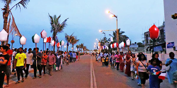 French Bastille Day parade in Puducherry with cultural floats and festivities.