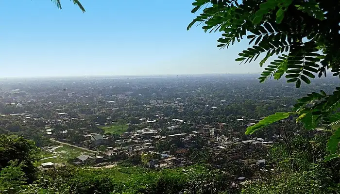 Modern industrial landscape contrasting Assam's nature - unique places to visit in Assam