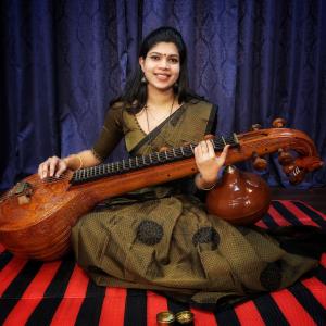 Classical Carnatic music performance in Puducherry with vocalists and mridangam.
