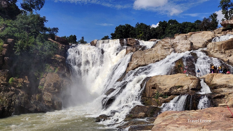 A scenic view of Dassam Falls cascading through lush greenery in Jharkhand.