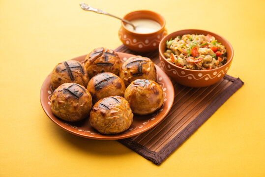Bihar's signature roasted wheat balls with spicy mash