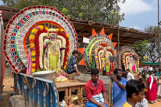 Devotees at Masi Magam festival in Puducherry with rituals on the beach.