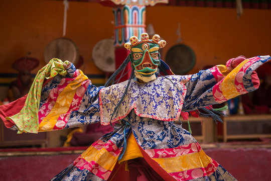 Colorful Cham mask dance at a Buddhist festival in Sikkim.