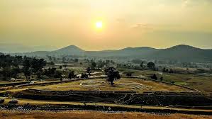 Nakti Dam in Jharkhand is a tranquil waterbody surrounded by hills.