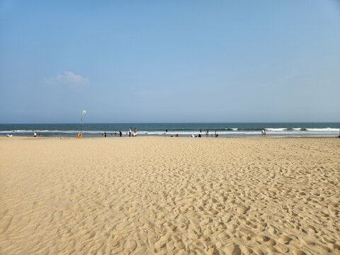 Pristine Paradise Beach in Puducherry with golden sands and turquoise waters.