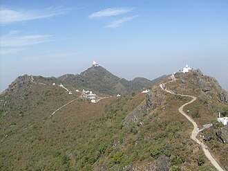 Sacred Jain temples dotting Parasnath Hills in Jharkhand.