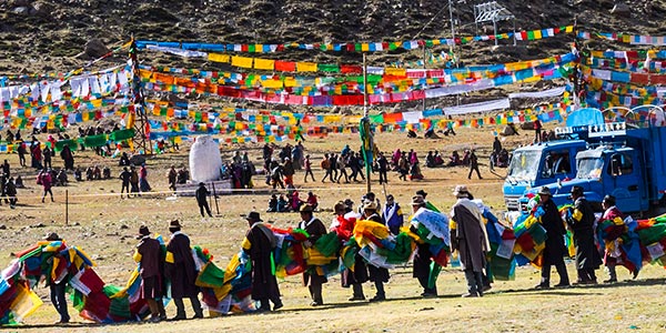 Devotees lighting butter lamps during Saga Dawa festival in Sikkim.