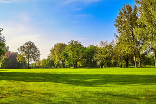 Vibrant Sanjahi Park with walking paths and greenery.