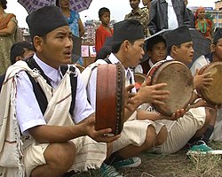 Musicians playing Tamang Selo folk music with a damphu drum in Sikkim.