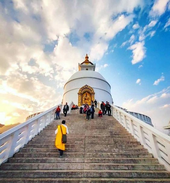 A serene Buddhist stupa offering panoramic views.