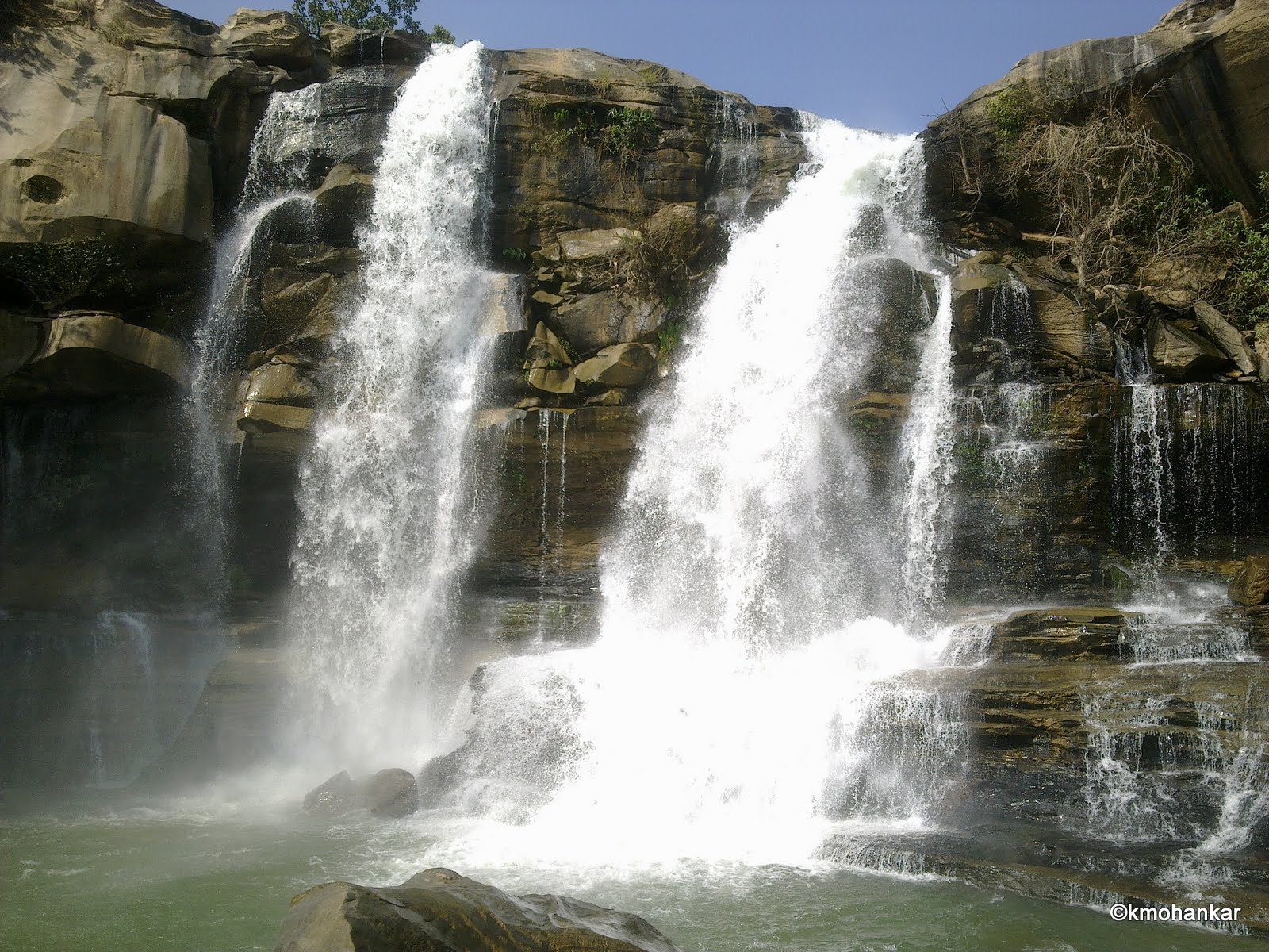 Cascading Amrit Dhara waterfall in lush surroundings of Chhattisgarh.