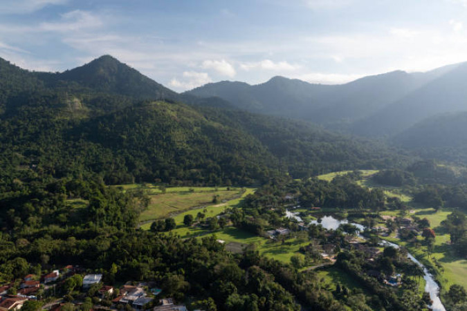A biodiverse wildlife sanctuary with jungle safaris and ancient temples.