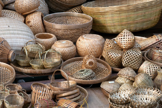 Handwoven bamboo baskets and rosewood carvings from Coorg