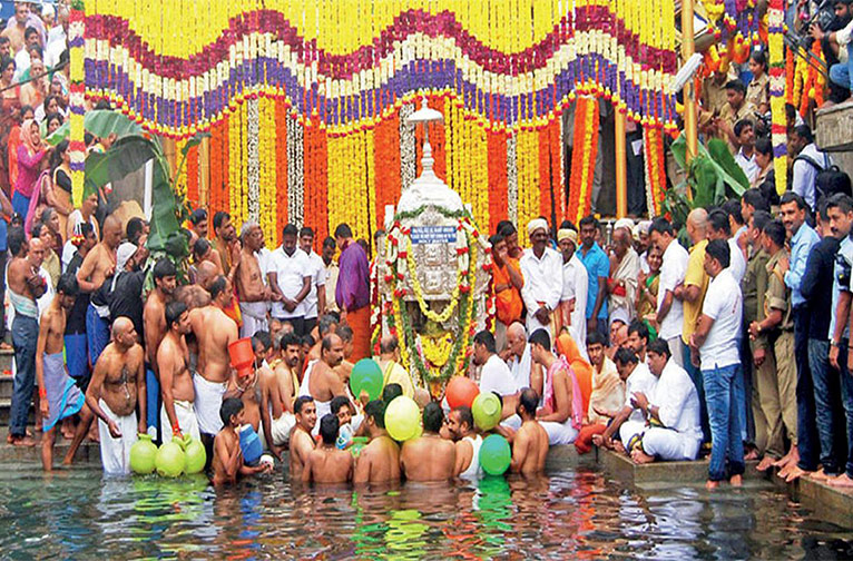 The Coorg City Page captures devotional singers in temple performances